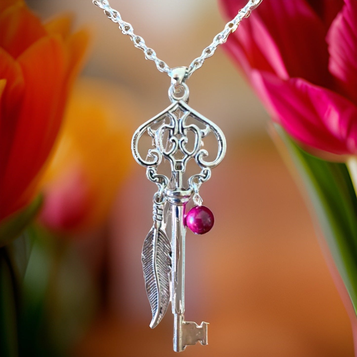 Skeleton Key Necklace with Pink Tiger’s Eye